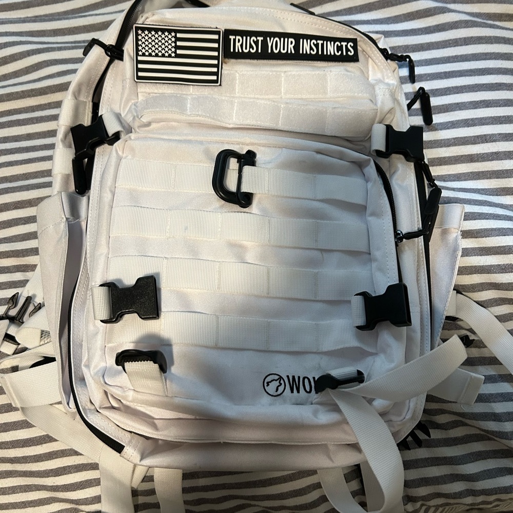 45L Wolfpack, barely used. I bought it at 190 so asking 150 obo